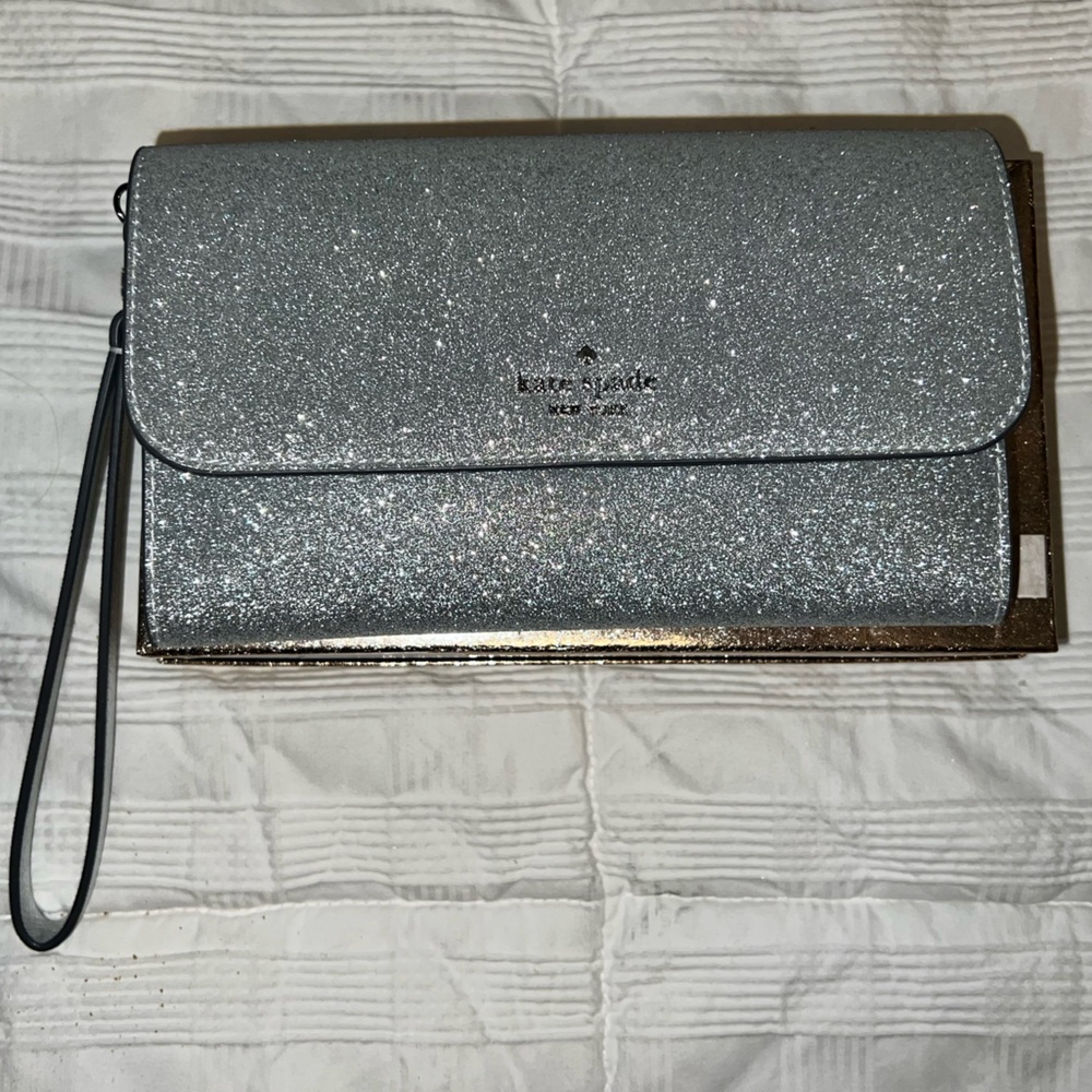 New with box Kate Spade Lunar Light Silver Glitter Phone Flap Wristlet Clutch